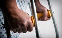 Person walking with crutches